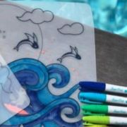 Mantel de silicona Surf con pulsera naranja